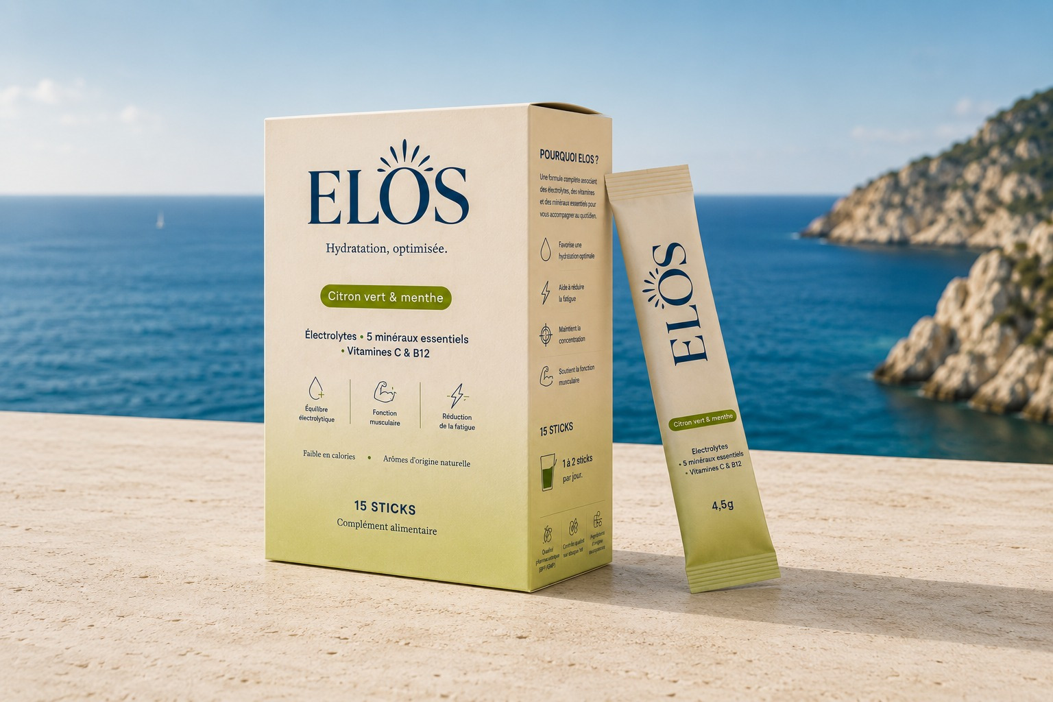 Boîte et stick ELOS citron vert & menthe posés sur la pierre, face à la mer Méditerranée